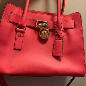 Authentic Michael Kors bags.